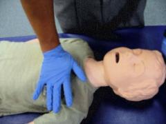 Figure of chest compressions performed with one hand