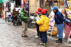 "Distribution of fire prevention awareness leaflets"